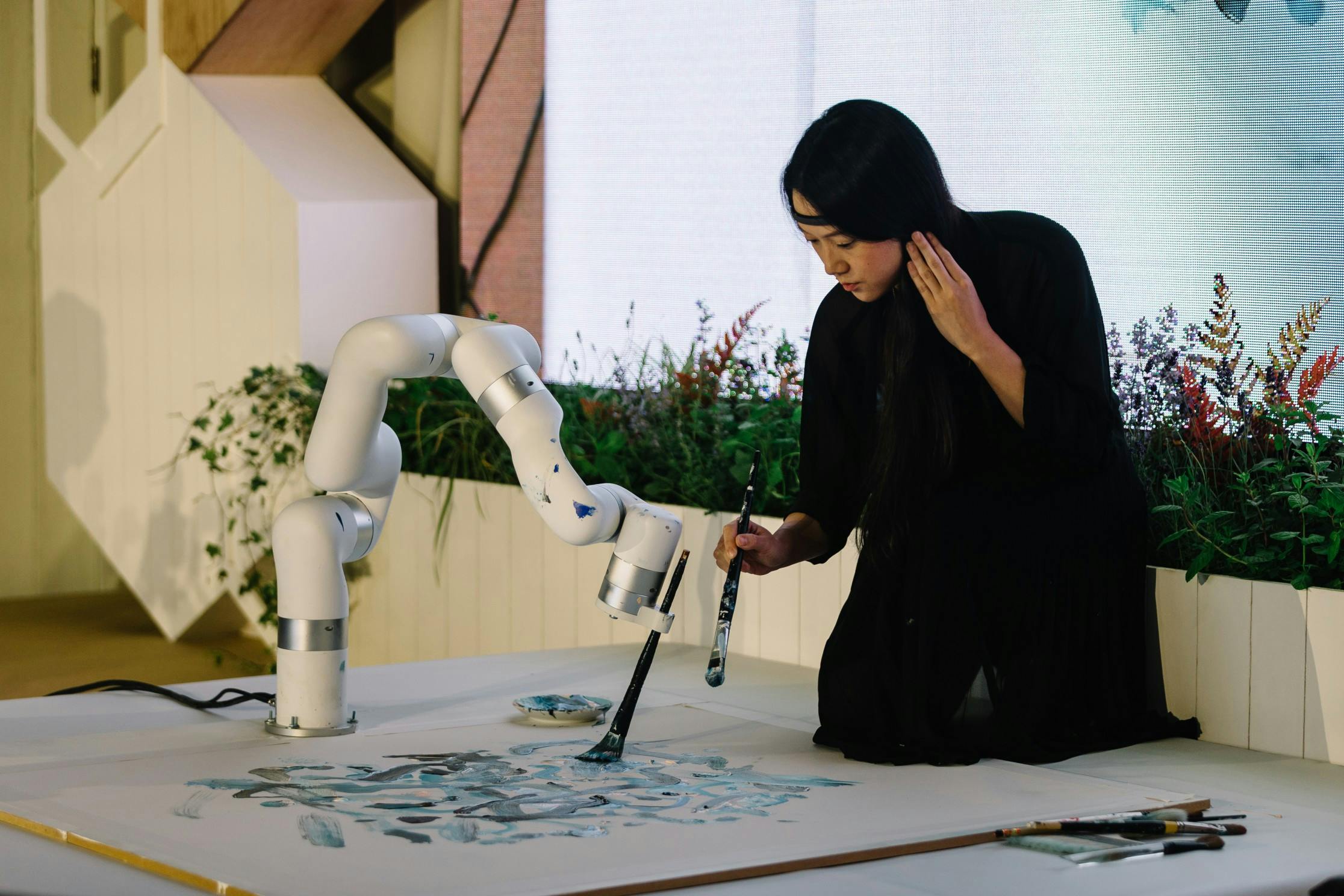 Woman creates art with robot